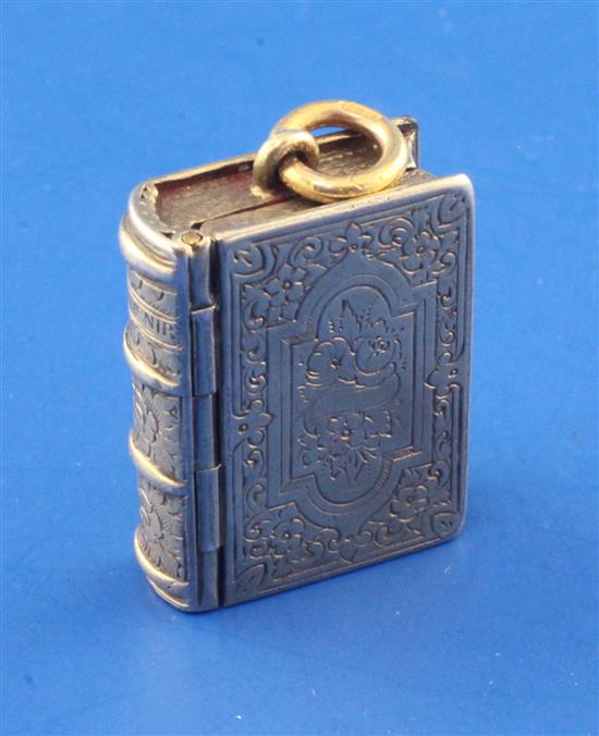 A Victorian engraved silver gilt vinaigrette by G. Wheeler & Co modelled as a Souvenir book, 1in,
